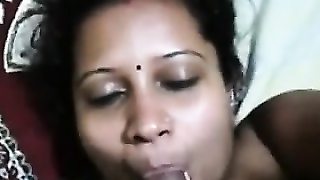 Indian Aunty Giving A Blowjob