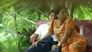 Spy cam video of chubby Desi woman riding and sucking cock outdoors