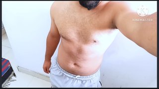 Young Indian desi gym boy giant muscle body and big bulge displaying in camera